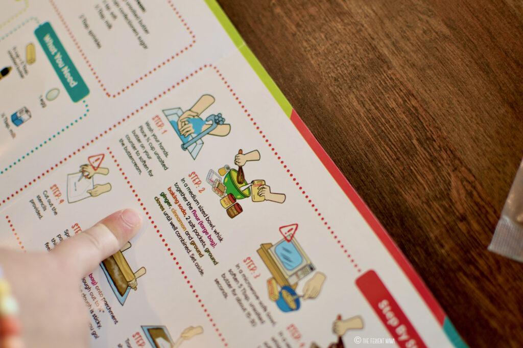Baketivity instruction guide closeup with child finger pointing