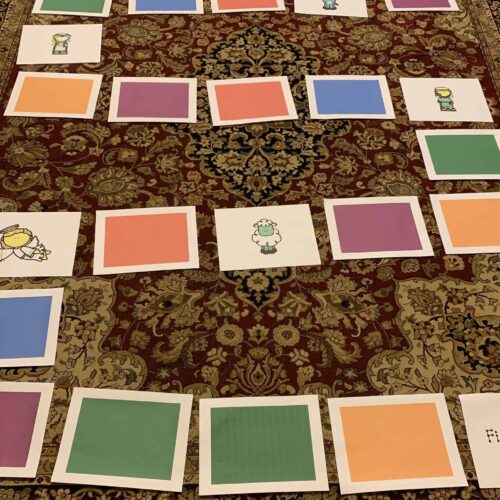 Color sorting activity for homeschool preschool education with colored cards and animal clipart illustrations for early learning and development.