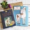 A children’s book, educational craft materials, and a potted succulent plant for homeschooling; inspired by "Misty of Chincoteague" by Marguerite Henry, perfect for homeschool science and reading activities.