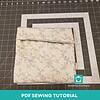 Step-by-step PDF sewing tutorial for homeschool projects, featuring fabric with delicate floral pattern, perfect for beginner and advanced sewists.