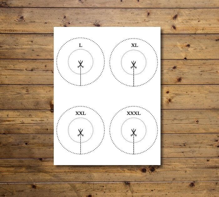 Educational scissor skills practice chart with four size circles labeled L, XL, XXL, XXXL for homeschooling activities.