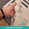 Hand sewing fabric with a knot for DIY projects, demonstrating basic sewing techniques for homeschool crafts.