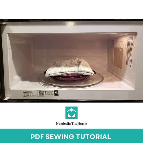 Homeschool Resource Co. - Microwave with sewing project inside Microwave oven with fabric and sewing project inside, demonstrating a creative homeschooling activity for DIY crafts and sewing lessons.