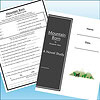 Slide1 Homeschool resource materials including a black cover book titled 'Mountain Born' by Elizabeth Yates and a worksheet with questions about the story.