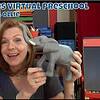 A colorful classroom scene featuring a smiling woman holding a gray elephant toy, with educational materials and storage bins in the background, promoting creative kids virtual preschool.