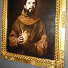 Religious Artwork of Saint with Sacred Heart Saint holding a sacred heart in a gold ornate frame.