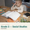 clareza-grade3-social-studies.jpg Young boy studying social studies at home with open book, pencils, and notebooks on desk.