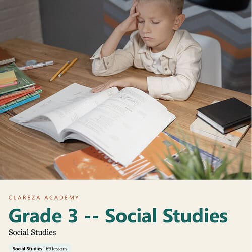 clareza-grade3-social-studies.jpg Young boy studying social studies at home with open book, pencils, and notebooks on desk.