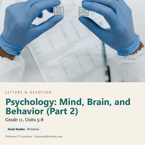 letters-devotion-g11_psychology_part2.jpg Hands in blue gloves holding two small microscope slides over educational materials for psychology study.