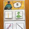 Preview of letter S board SATPIN Phonics Educational worksheet featuring images of a spoon, snake, and sticks for early learning activities.