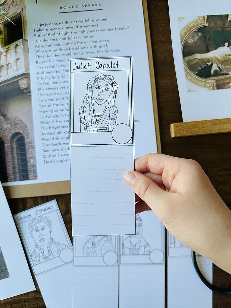 Hand holding a custom illustrated bookmark with Juliet Capulet drawing for homeschool reading activities.