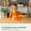 letters-devotion-gk_numbers_shapes_and_stories_kindergarten_mathematics-math-u7.jpg Young girl playing with educational math toys on a wooden table in a bright, modern kitchen.