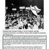 original-12551084-1.jpg Protest scene with people holding signs and a flag, advocating for the preservation of the constitutional vote in Alabama.